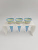 ice cream cones sitting on playstand 