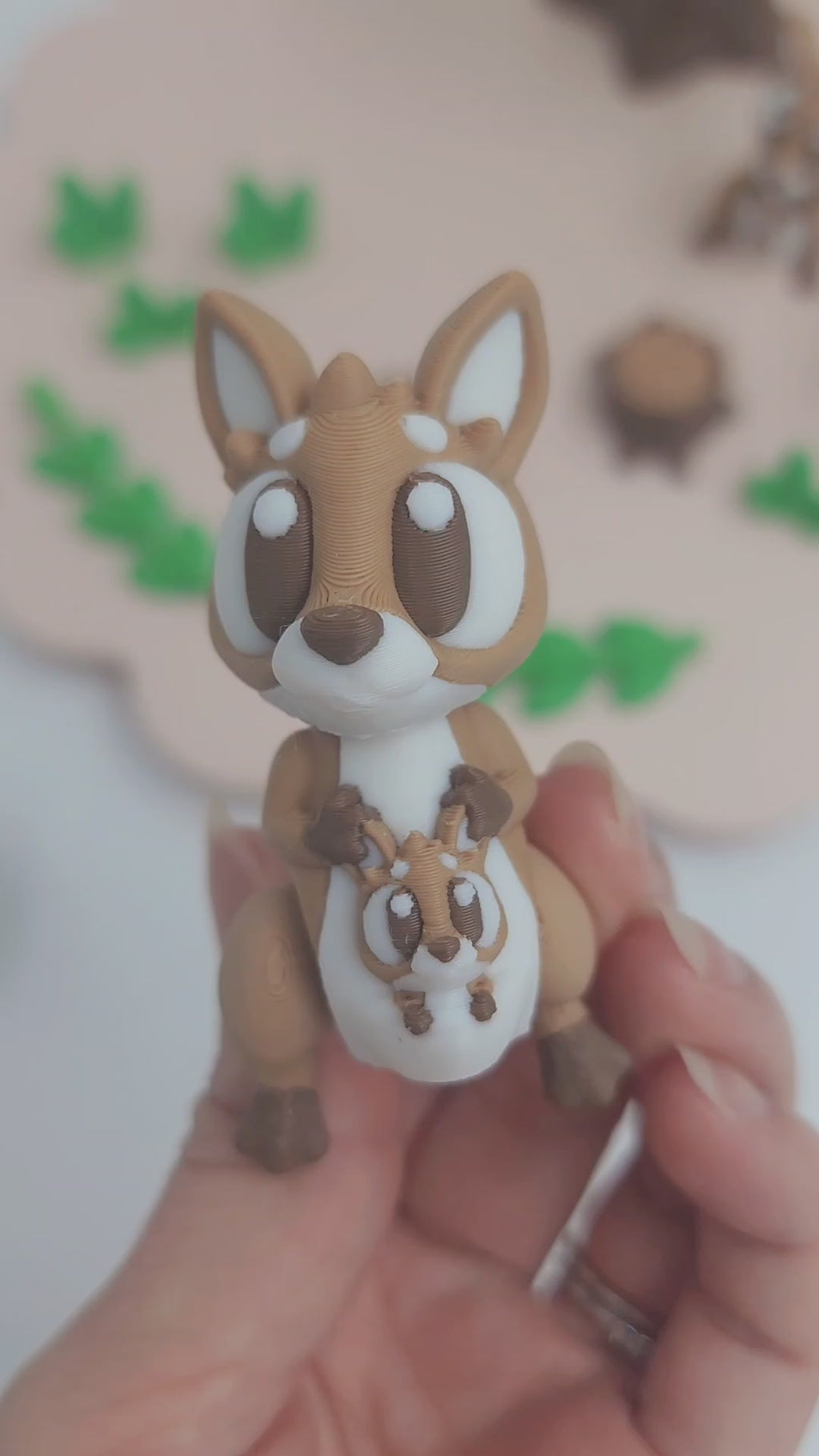 close up of kangaroo and joey figurine 