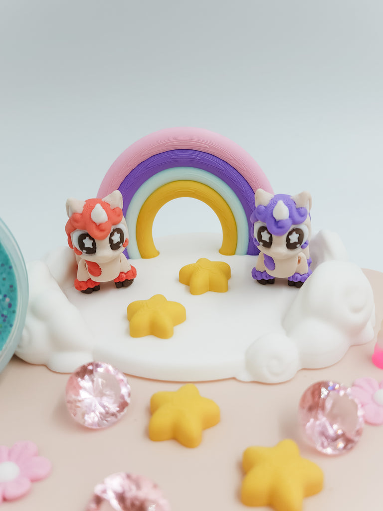 unicorns on rainbow prop 